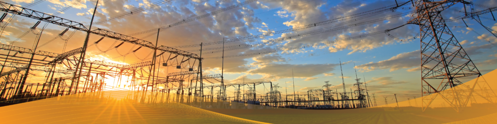 A wide panoramic banner of an electrical substation and high-voltage transmission lines at sunset, with power infrastructure silhouetted against a partly cloudy sky and a translucent orange graphic overlay along the bottom of the image.